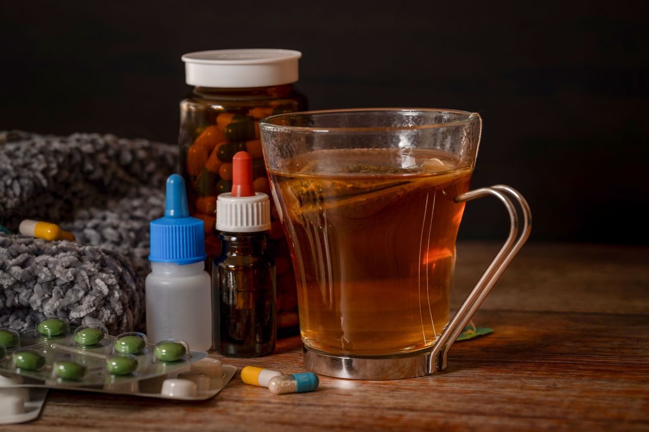Mastering the First Impression: Your intriguing post title goes here A cup of herbal tea with medications suggests natural cold remedies for healing.